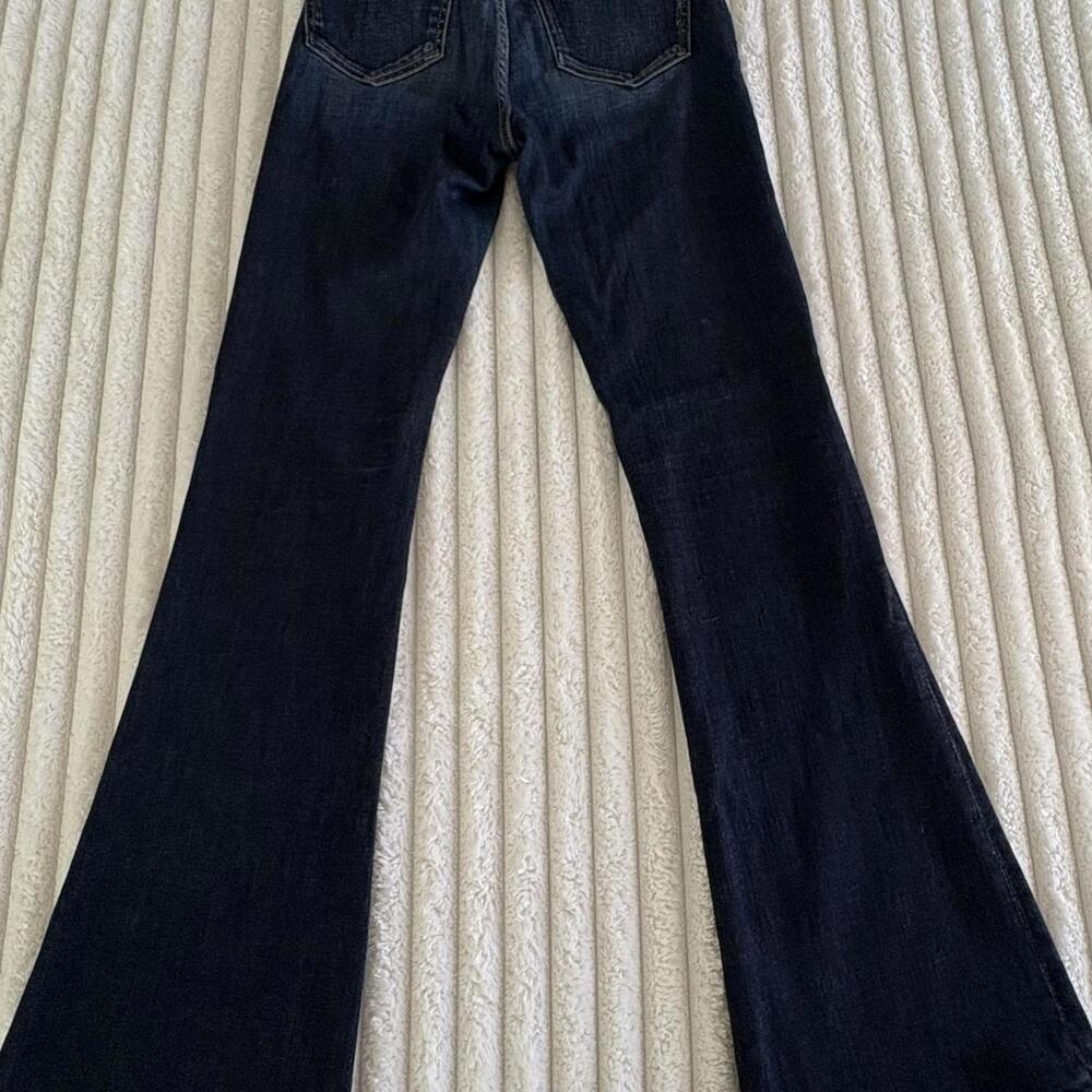 Dark blue wash bellbottom mid-rise skinny jeans